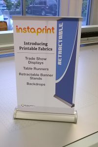 Photo - sample product of table-top mini retractable banner stands